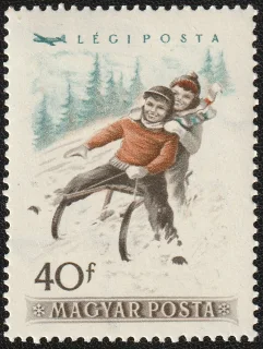 Two Children Sledding