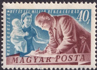 Békeívet aláíró munkás