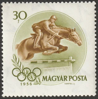 Akadályt ugrató lovas